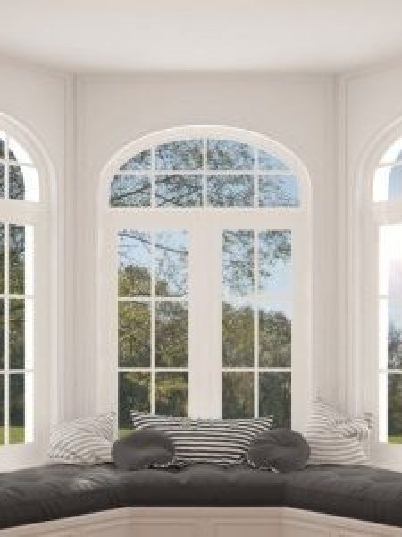 Image depicts a set of bow windows from NorthShield Windows & Doors