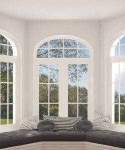 Image depicts a set of bow windows from NorthShield Windows & Doors