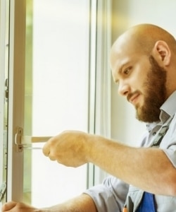 Image depicts a window replacement professional from NorthShield.