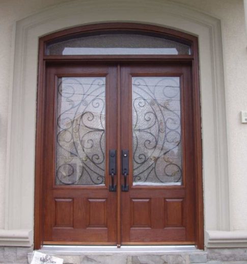 brown fiberglass door with glass inserts