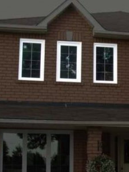 Image depicts three casement windows in a home.