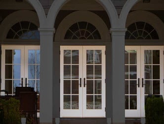 Image depicts a Winnipeg home with patio doors.