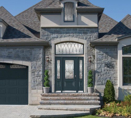 Image depicts a home with a new front door.