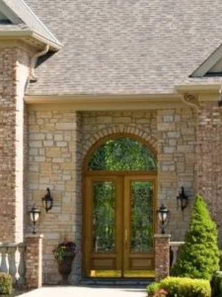 Image depicts a home's entry door.