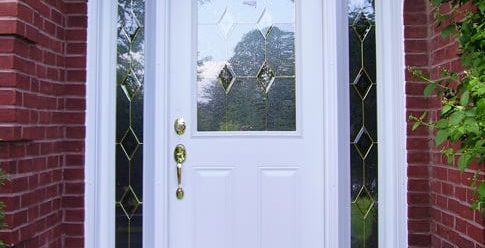 Image depicts a white fiberglass entry door.