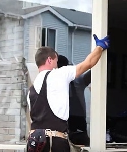 Image depicts NorthShield installers with a full framing window.