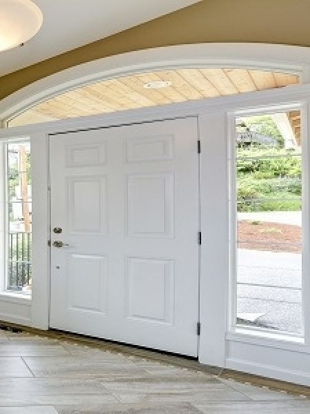 Image depicts an entry door in a Winnipeg home.