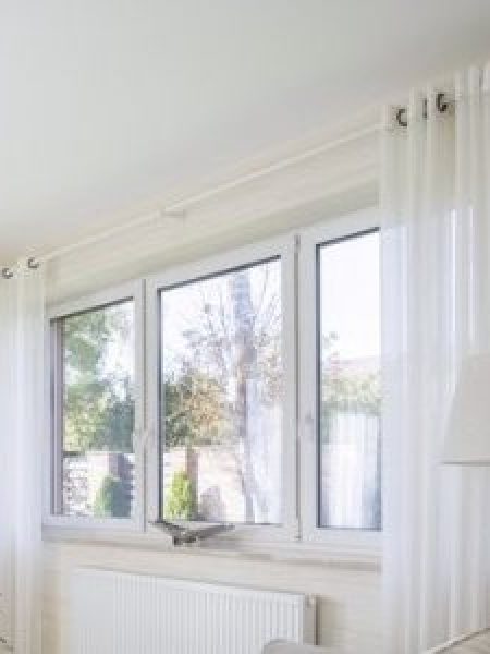 Image depicts three windows in a home.