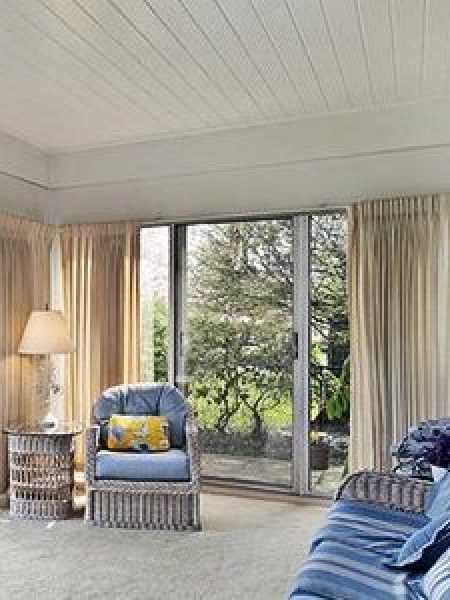 Image depicts patio doors for a sunroom.