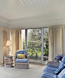 Image depicts patio doors for a sunroom.