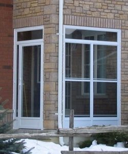 Image depicts a storm door from NorthShield Windows & Doors.