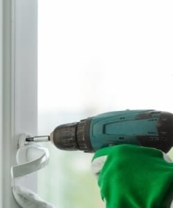 Image depicts someone replacing an old window.