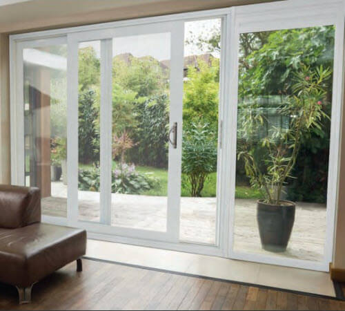 Image depicts sliding patio doors installed in a home.