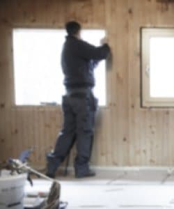 Image depicts NorthShield worker replacing vinyl windows.