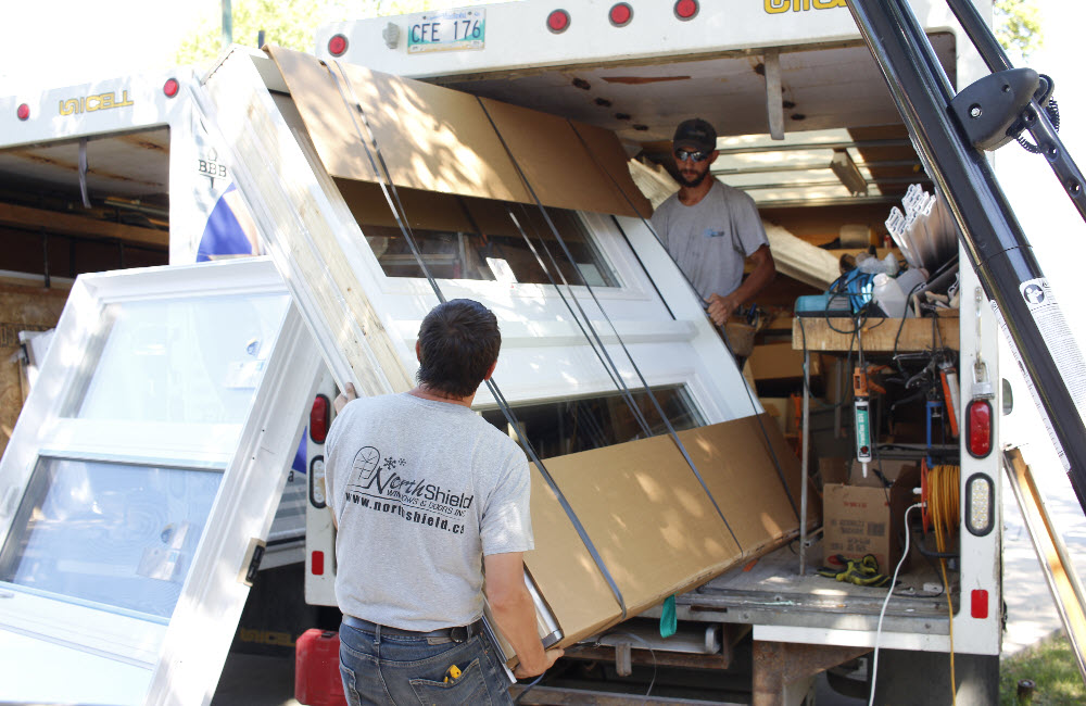 Windows and Doors Replacement unloading from truck in Orangeville