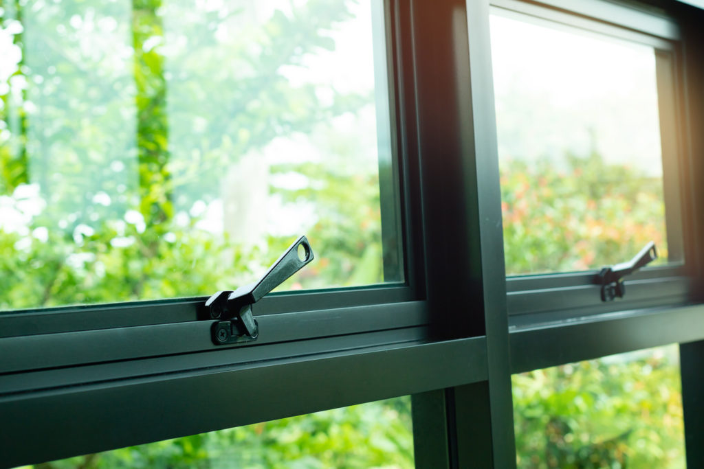 wiping your windows clean black vinyl windows