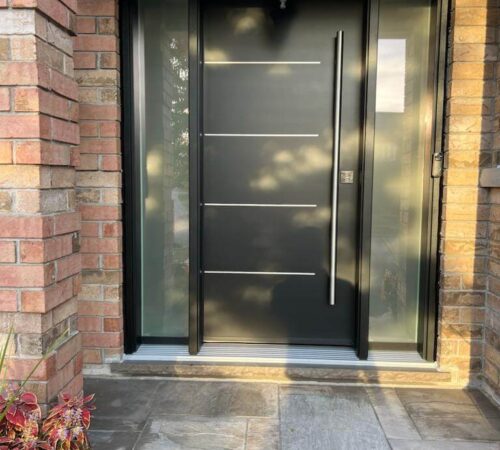 black fibreglass entry door installation