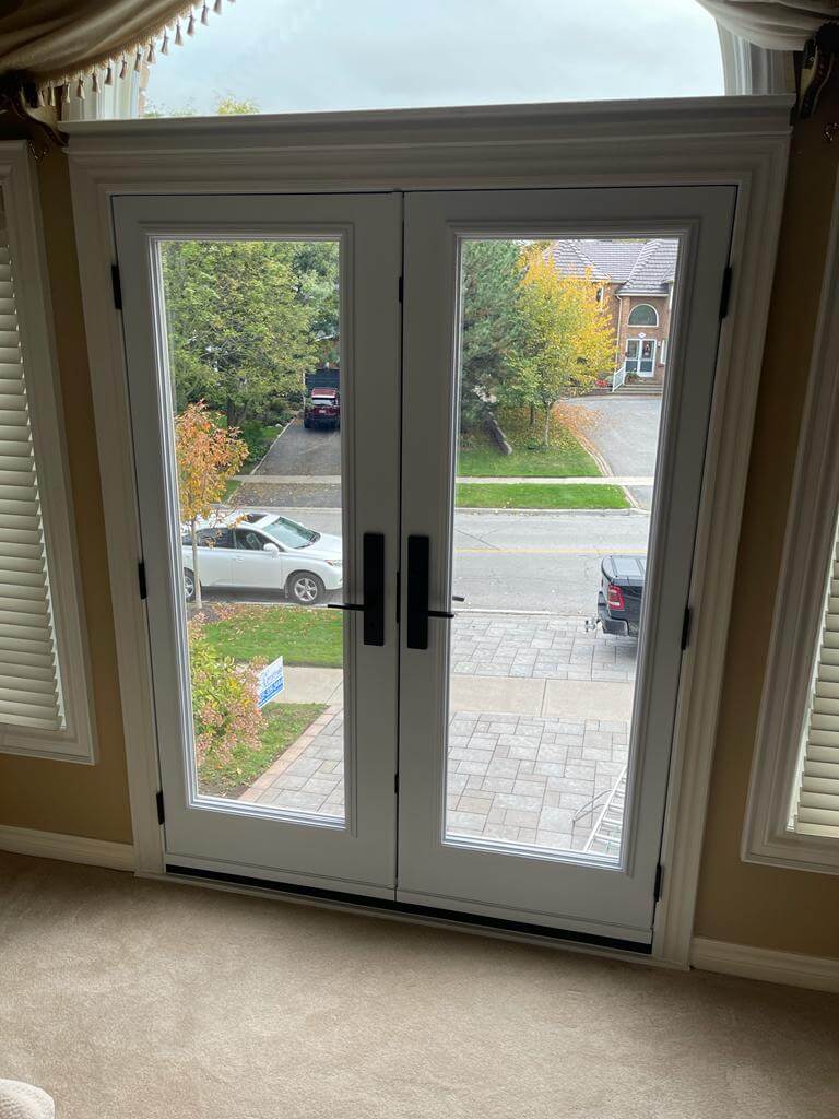 french patio door installation viewed inside house