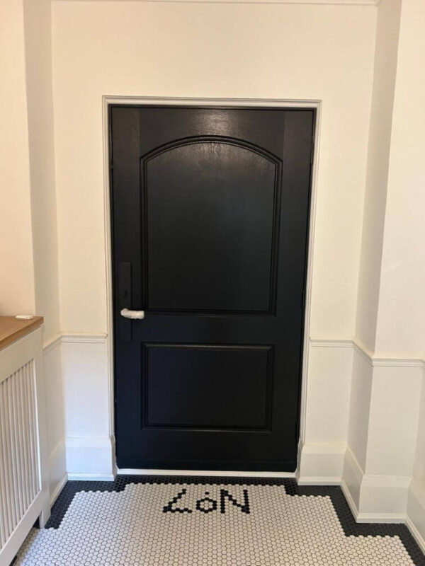 Black fiberglass single entry door inside