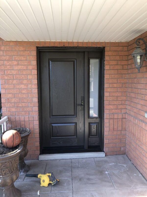 Black fiberglass single entry door with sidelight