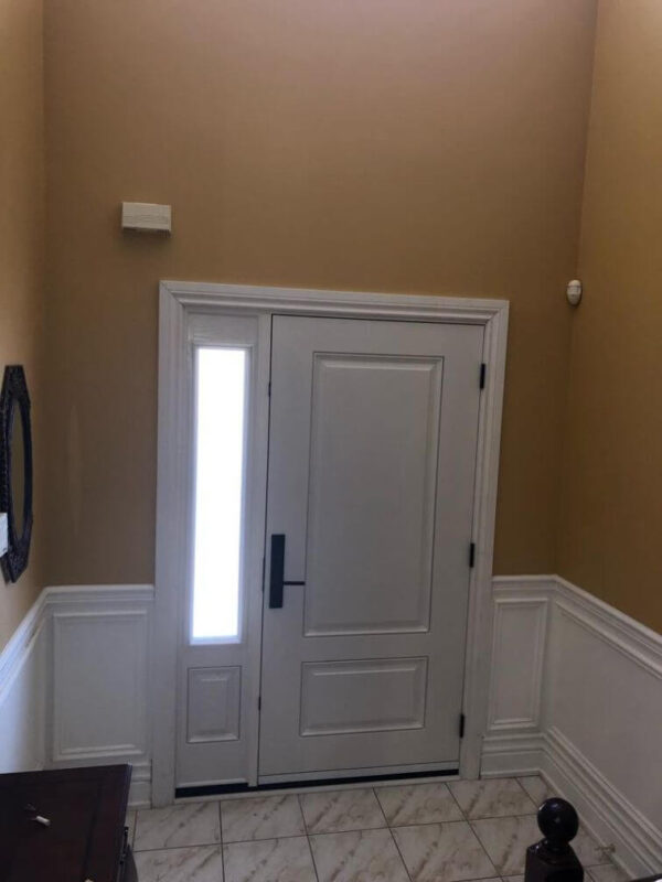 Black fiberglass single entry door with sidelight white inside