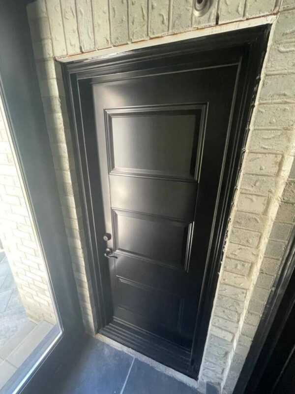Black steel entry door with black threshold