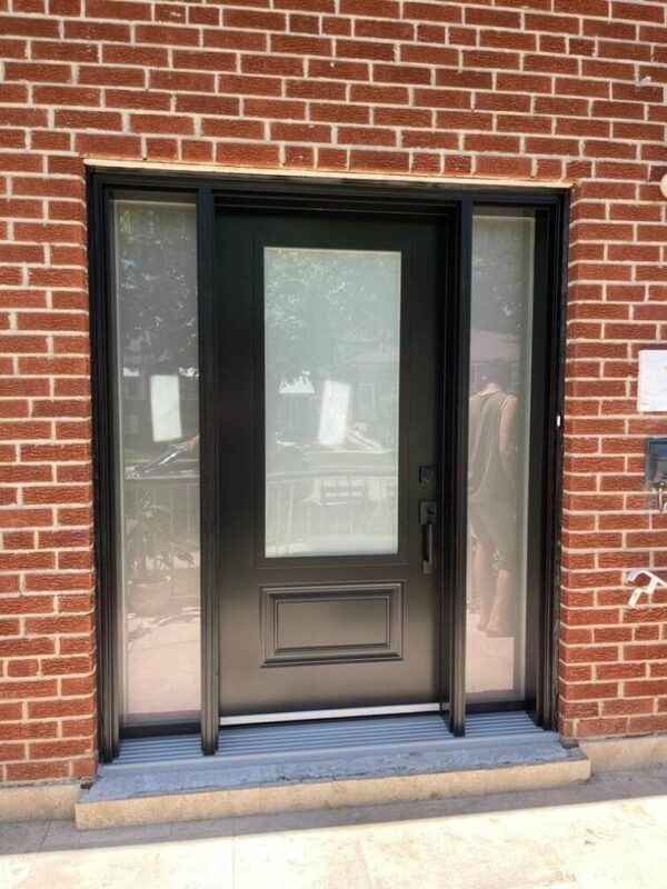 Black steel entry door with frosted glass insert