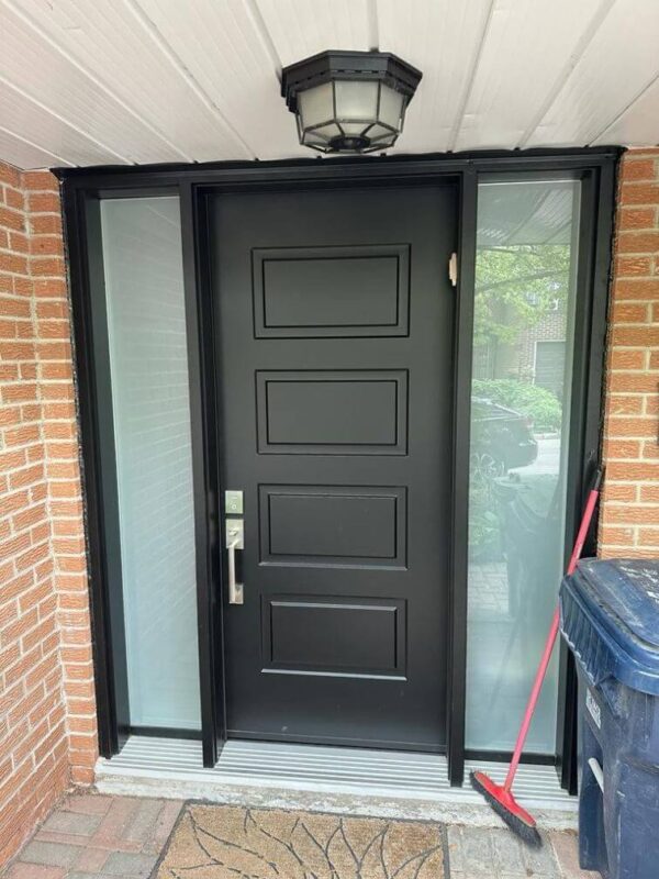 Black steel entry door with frosted sidelites