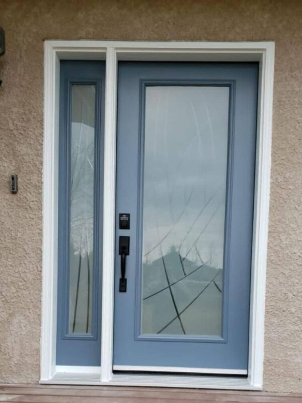 Blue steel entry door with white frame and sidelite