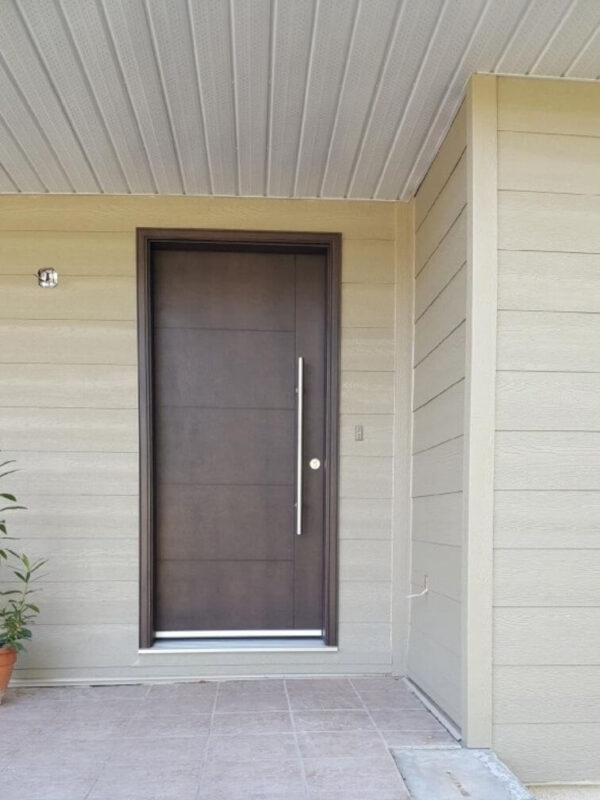 Brown fiberglass entry door with pull handle