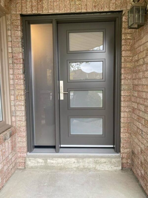Brown steel entry door with frosted glass inserts and sidelite