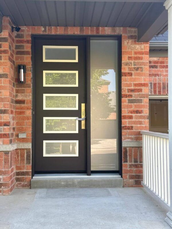 Brown steel entry door with glass inserts and sidelite