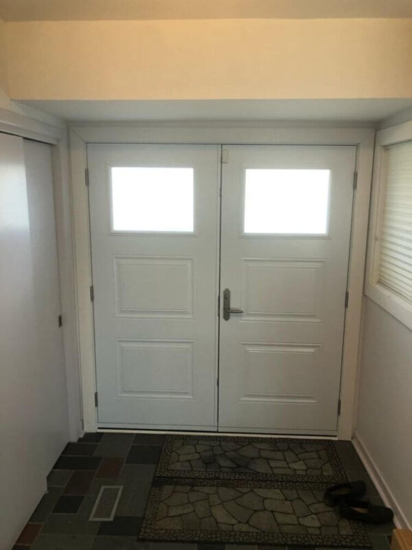 Burgundy steel double entry door with glass inserts and white colour inside