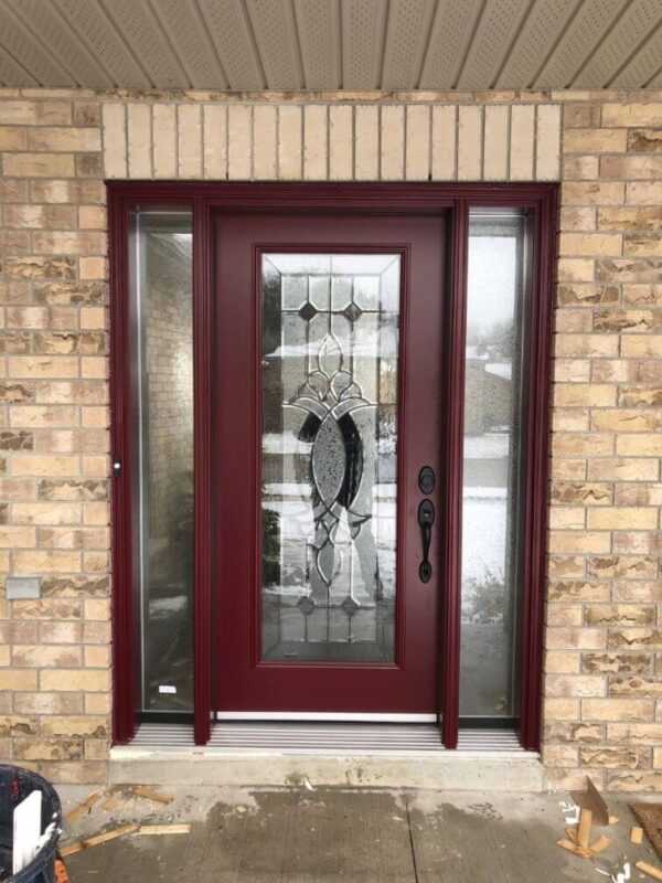 Burgundy steel entry door with glass insert and sidelites