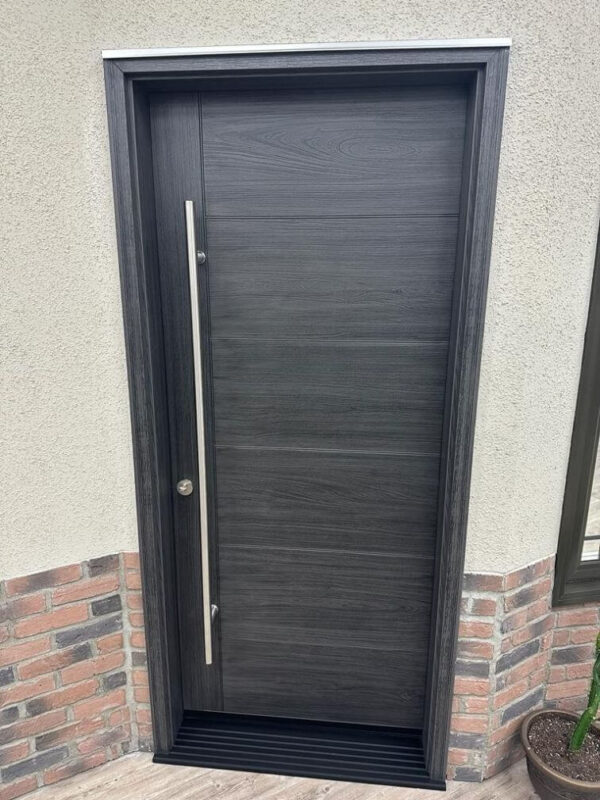 Grey fiberglass entry door with pull handle