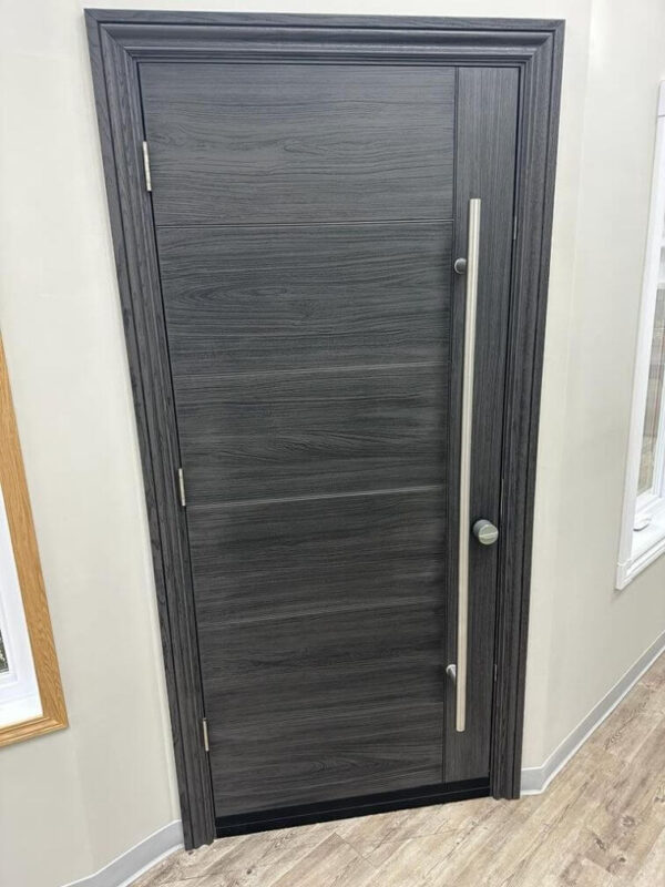 Grey fiberglass entry door with pull handle inside
