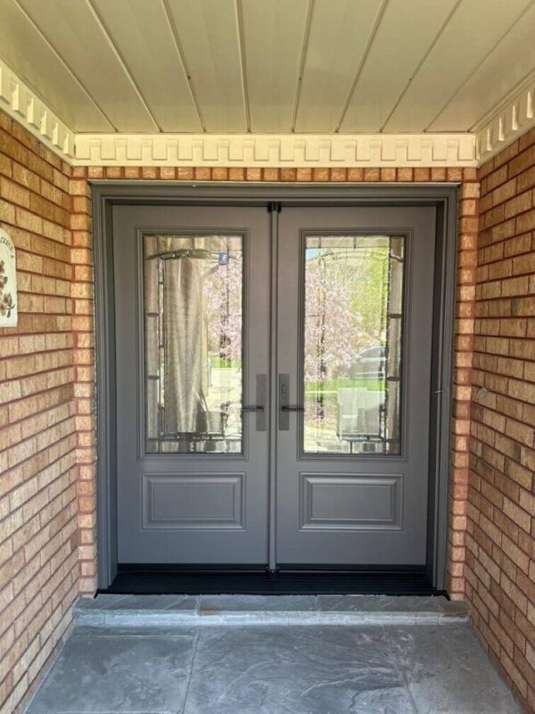 Grey steel double entry door with glass inserts