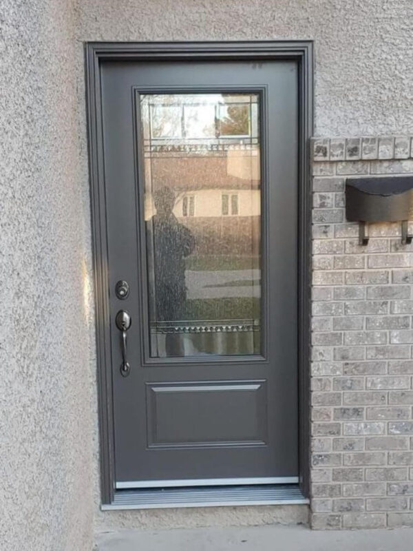 Grey steel entry door with glass insert