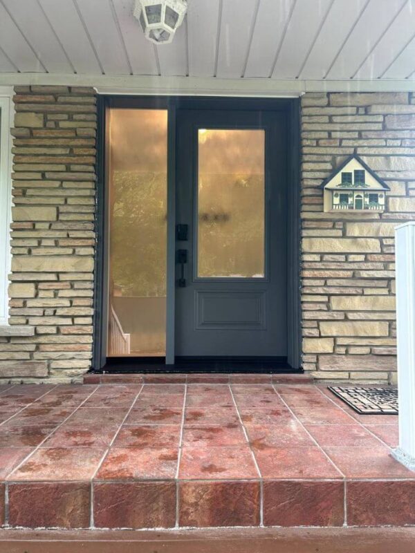 Grey steel entry door with glass insert and sidelite