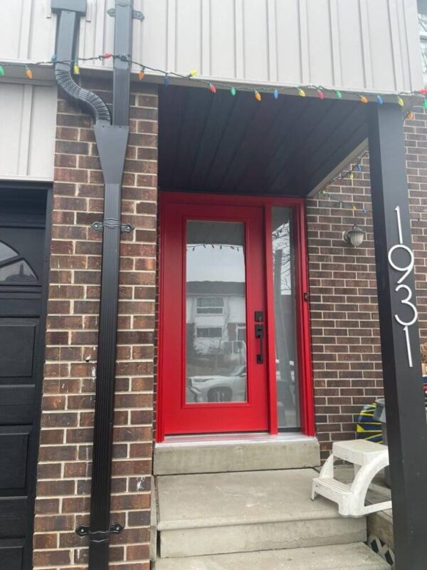 Red steel entry door with full glass inserts