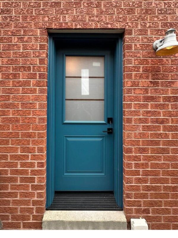 Teal steel entry door with glass insert