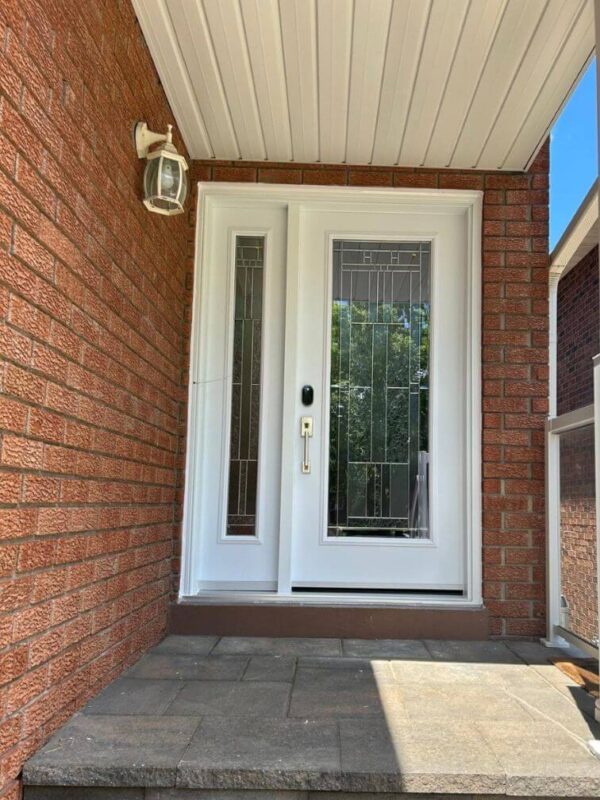 White steel entry door with glass insert and sidelight