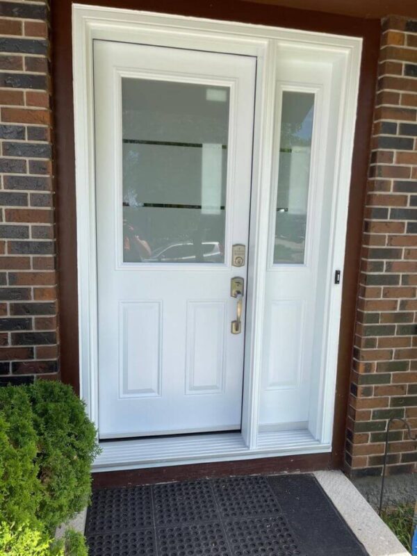 White steel entry door with sidelight