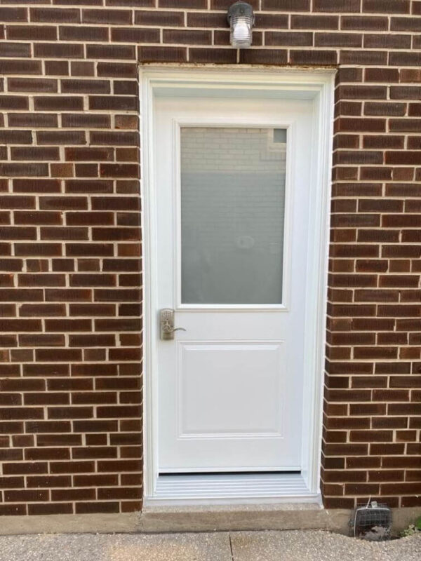 white steel entry door with frosted glass insert