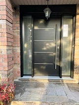 black steel entry door with aluminum inserts