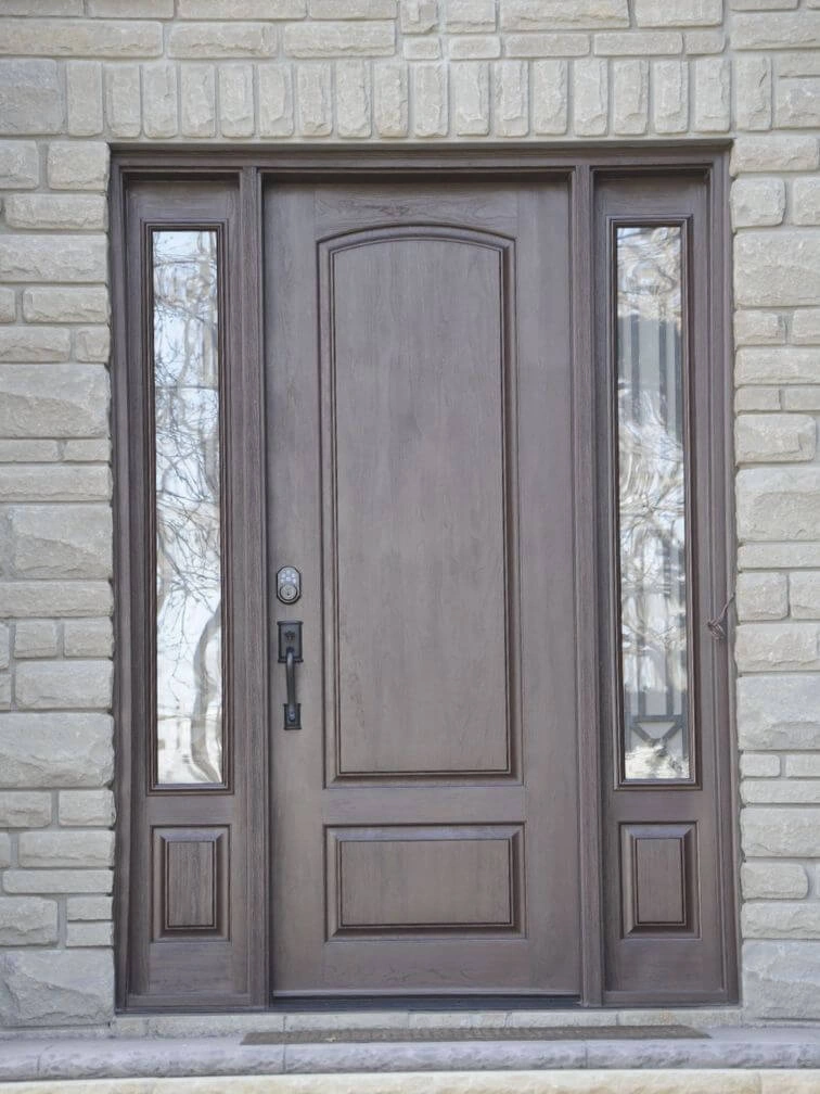 brown fiberglass entry door with iron design sidelites