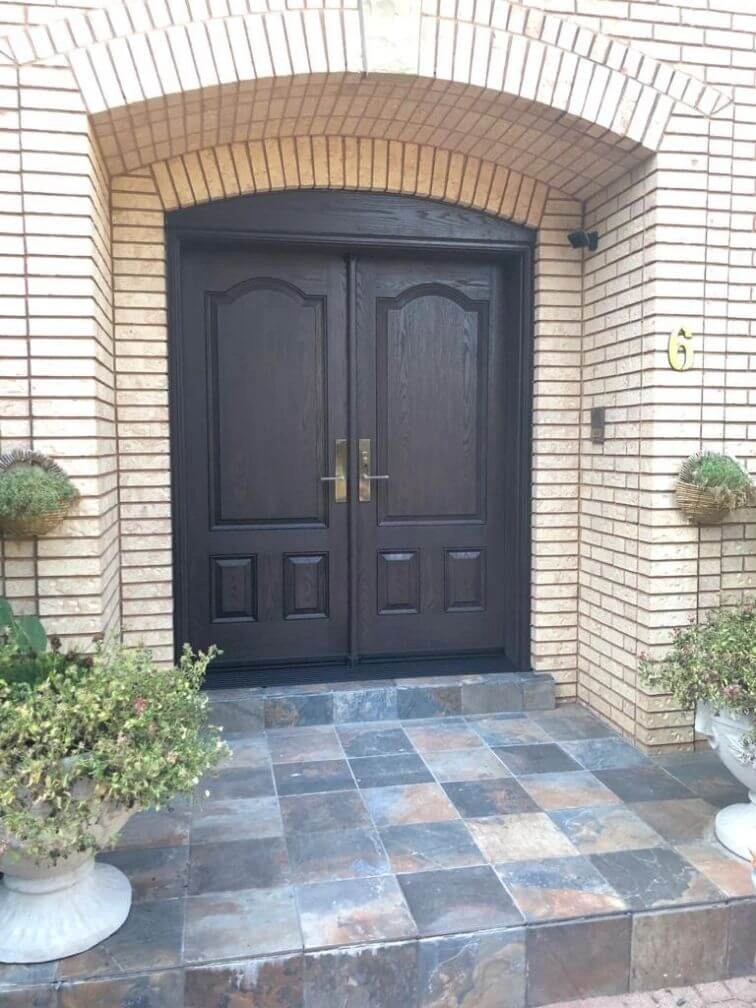 dark brown fiberglass double entry door
