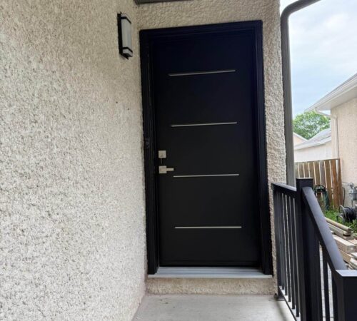 Black steel door with aluminum inserts Winnipeg