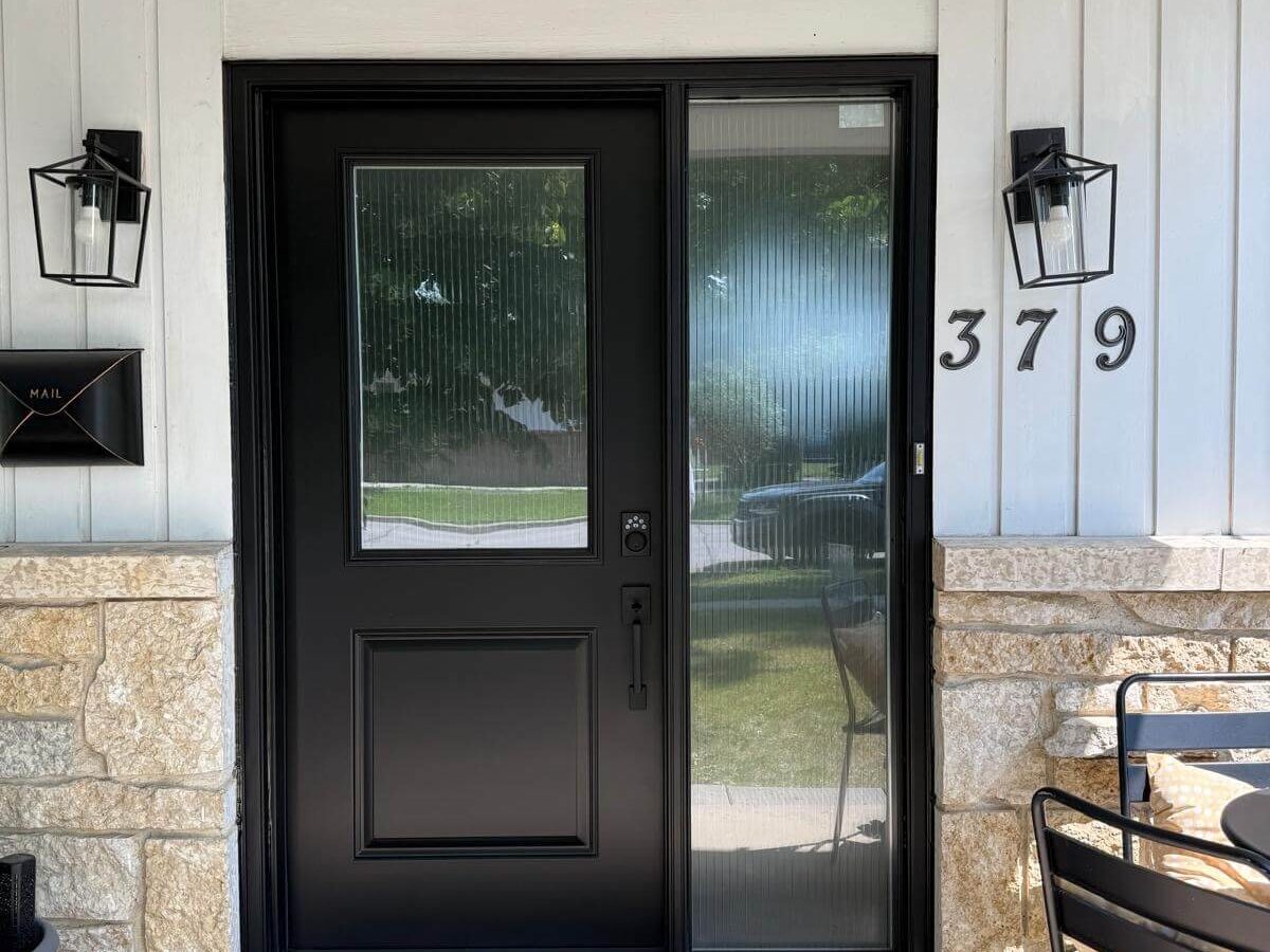 Black steel front door installation Winnipeg