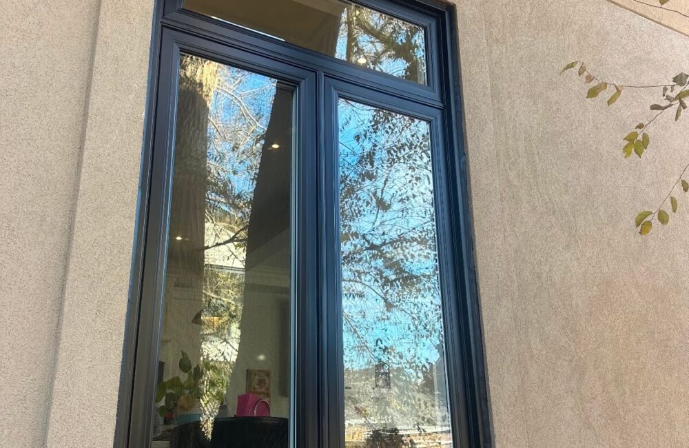 Black windows installation in Sharon house